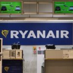 Fellow passengers pull back man partly sucked out of broken window on a flight from Greece